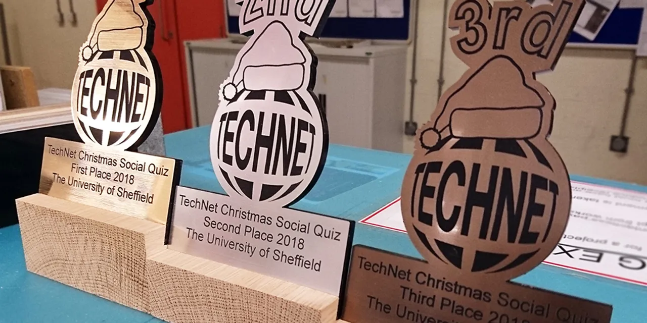 Laser-cut wooden trophies for TechNet quiz made with Trotec CO₂ laser engraving machine