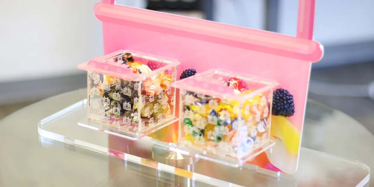 Acrylic candy boxes with laser-engraved patterns made using Trotec Speedy series laser cutter