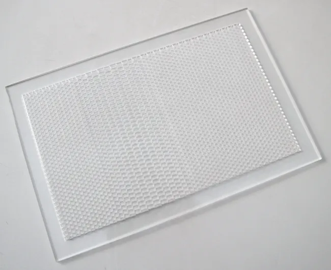 Honeycomb pattern laser engraved on clear acrylic using Trotec CO₂ laser cutter