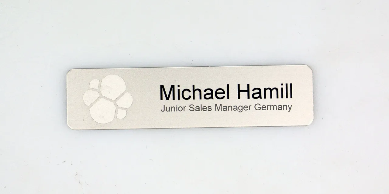 Laser-engraved name badge created with Trotec CO₂ laser showing name and job title