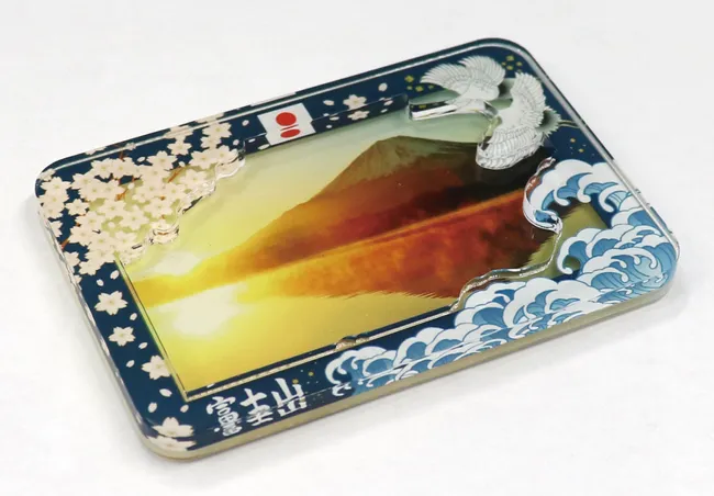 Acrylic photo frame with Mt. Fuji image, cherry blossoms and waves, cut with Trotec laser cutter