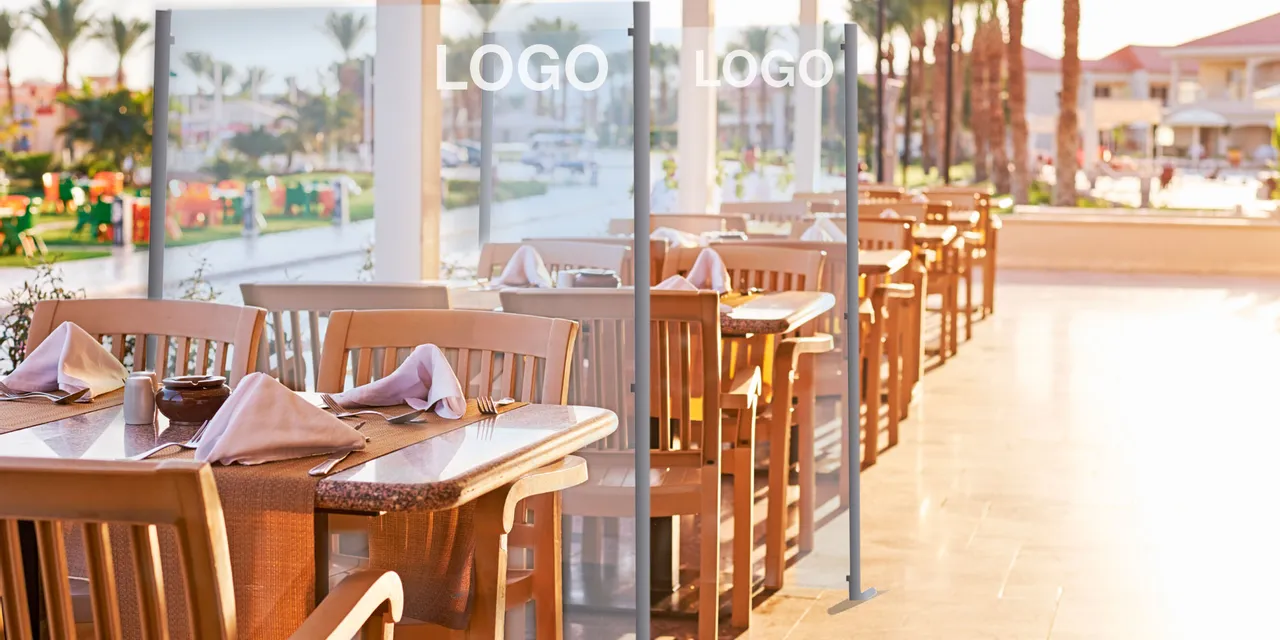Outdoor restaurant with laser-engraved acrylic dividers made using Trotec laser cutter
