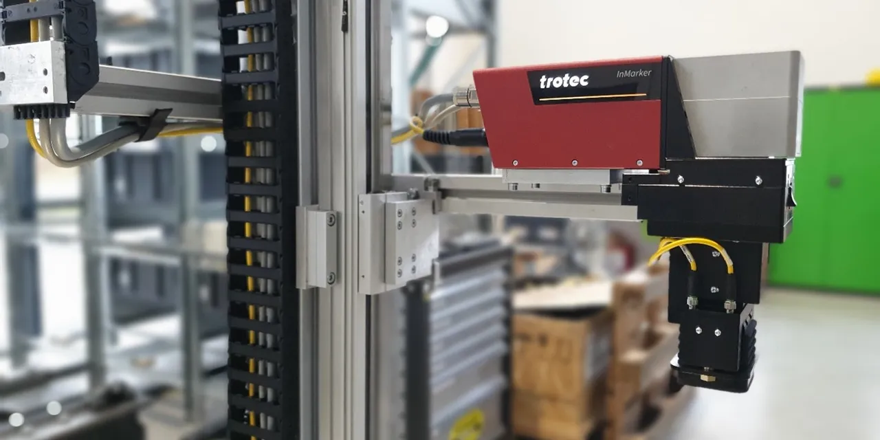Trotec InMarker laser marking system mounted on industrial automation frame
