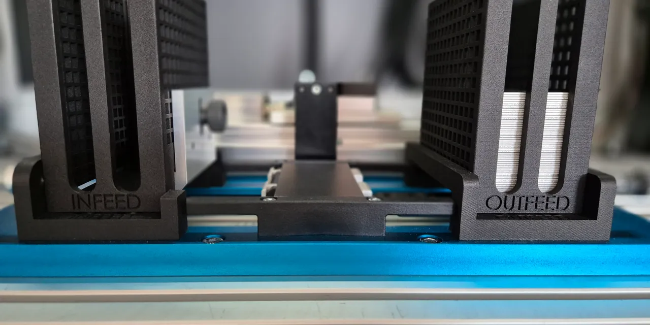 Trotec SpeedMarker laser marking system with infeed and outfeed card stack holders