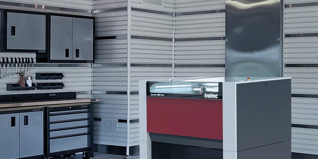 Trotec Speedy 400 flexx CO₂ laser engraver in modern workshop setting