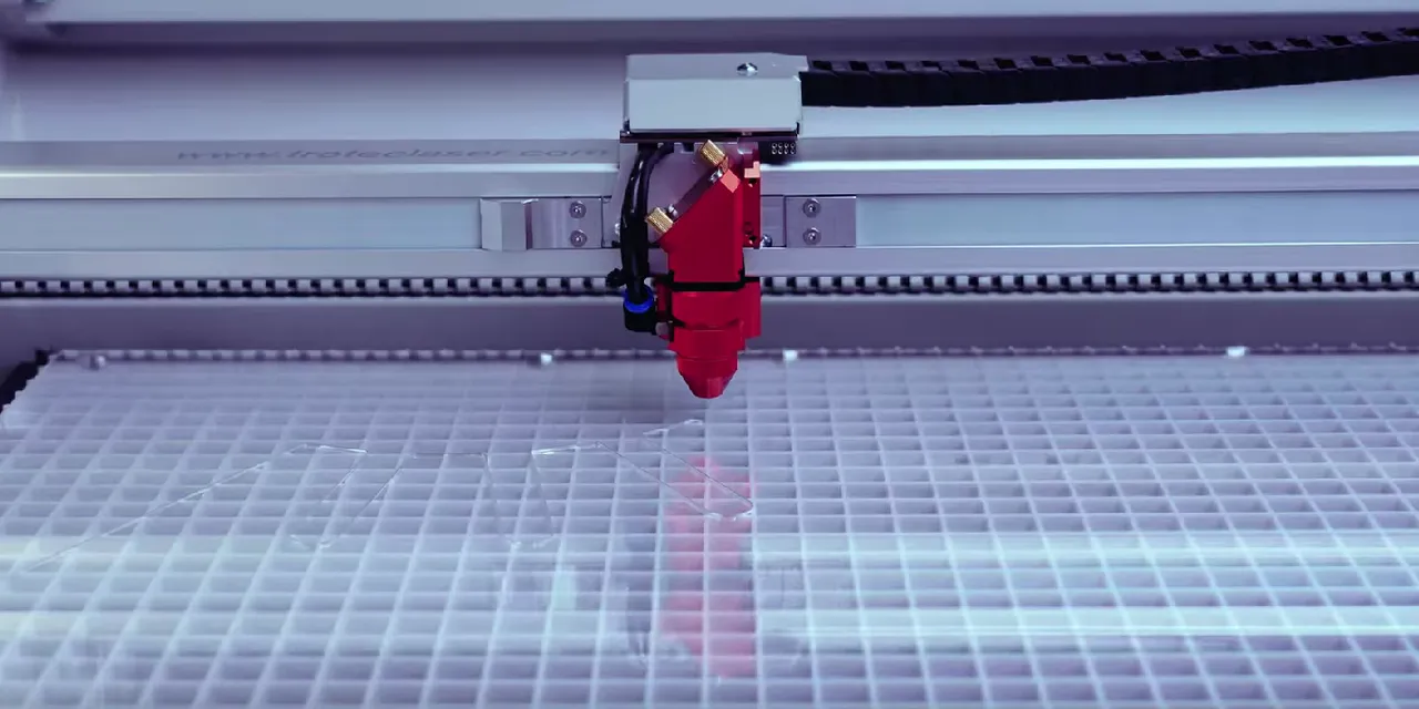 Trotec Speedy series laser cutter engraving acrylic sheet with precision CO₂ laser